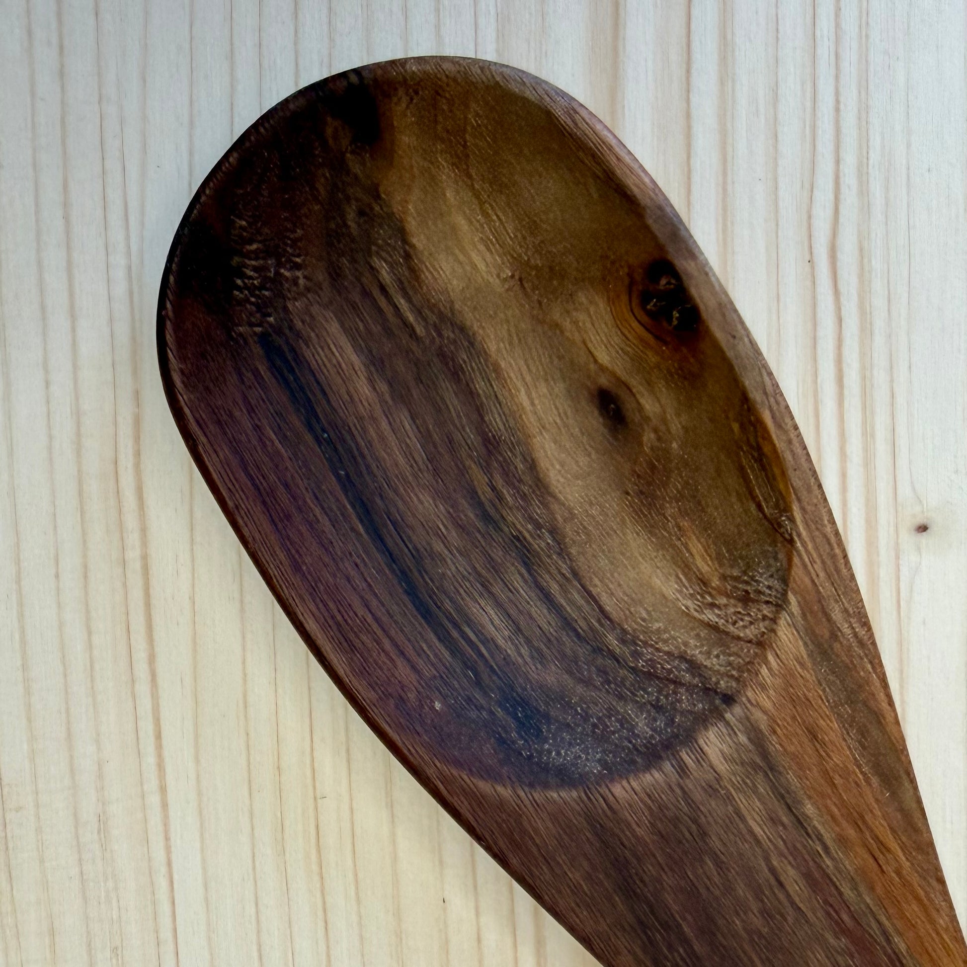 Wide bowl black walnut spoon close-up detail